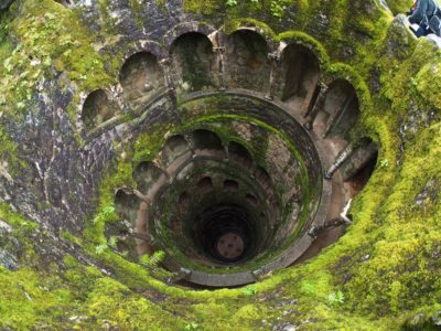 Looking down the Initiation well at Quinta da Regaleira | Image via Wikimedia commons author Stijndon