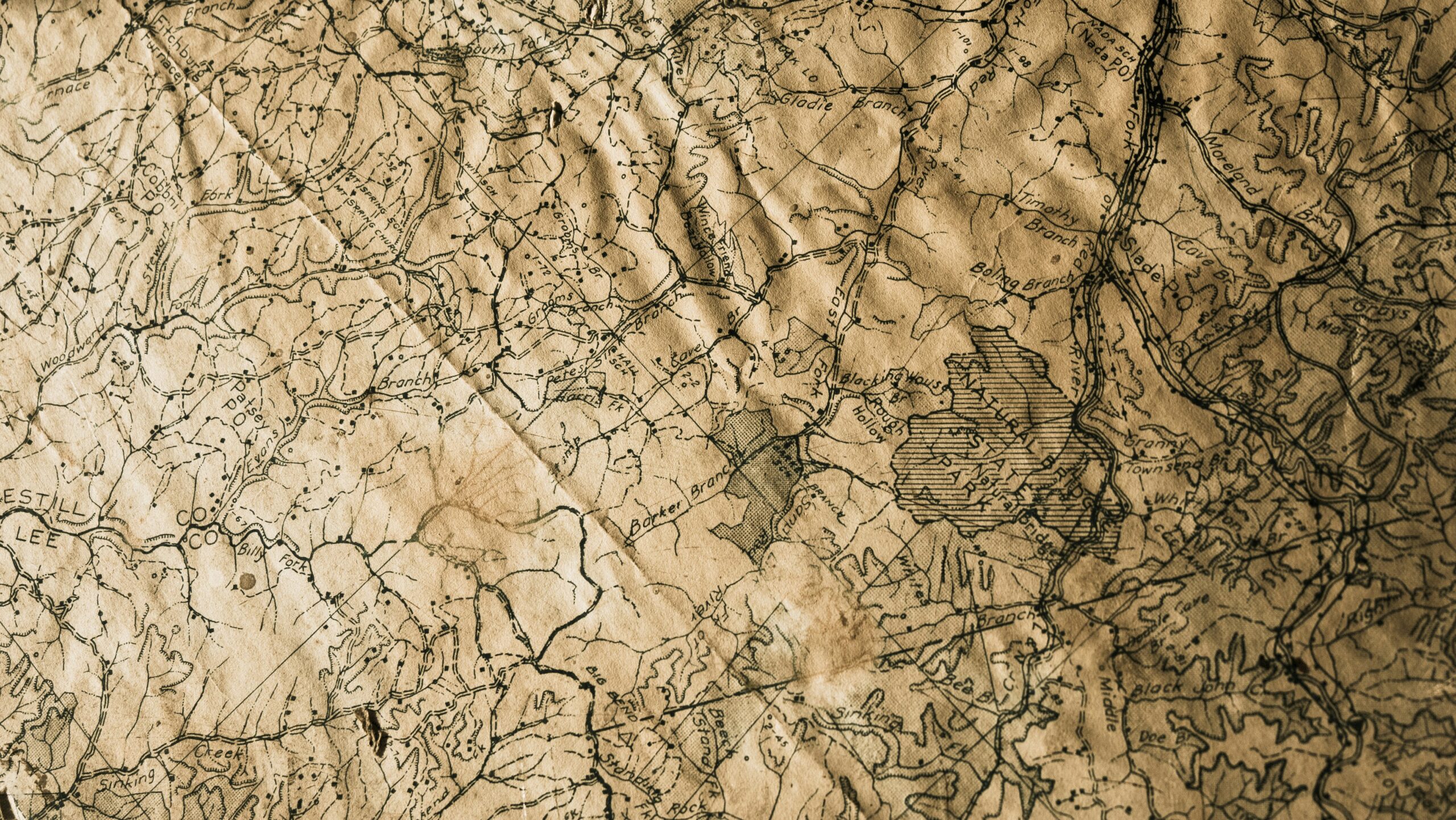 A photograph of a wrinkled old map.