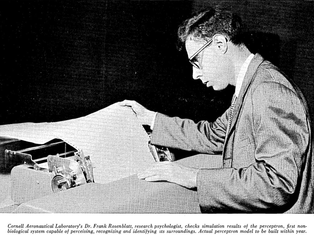 A man from the late 1950s examines a computer printout